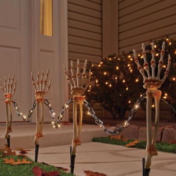 Celebrations Halloween Warm White 18 in. LED Prelit Chained Skeleton Arms Pathway Decor