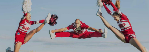 Team of Cheerleaders Jumping 